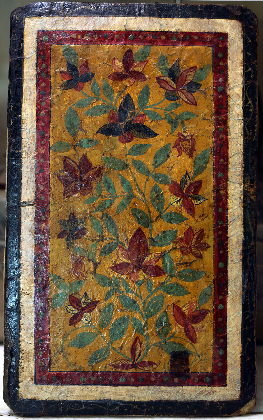 Mitra Etezadi: Old Quran cover after restoration